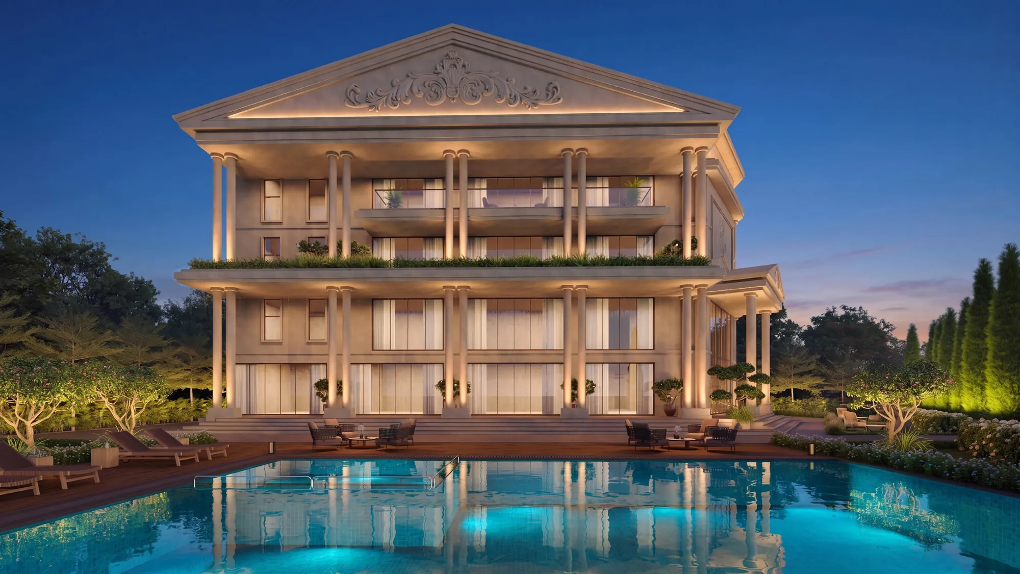 The Parthenon clubhouse at dusk, a colonnaded three-storey building beside the swimming pool
